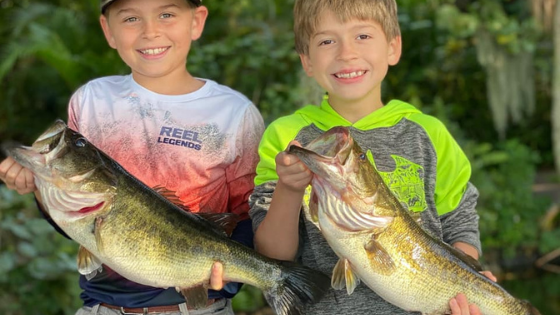 Kids holding Fish
