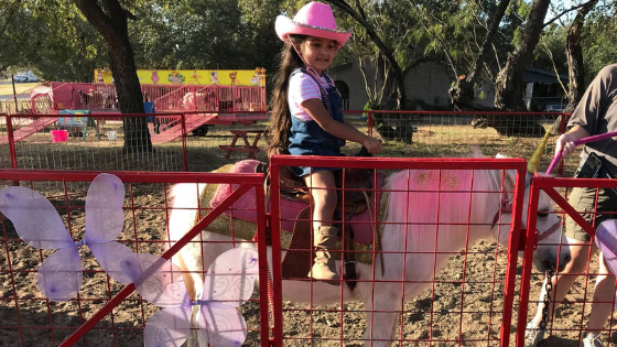 Child riding a pony