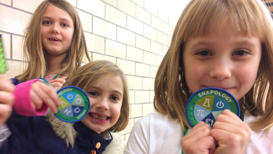 Girl Scouts with badges