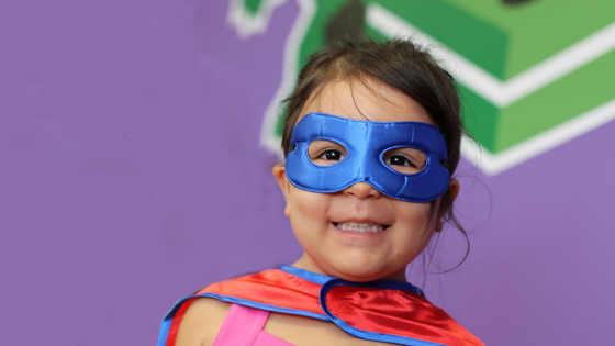 girl dressed as a superhero