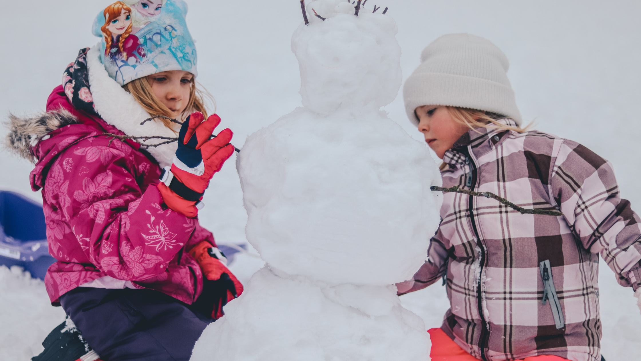 children building a snowman