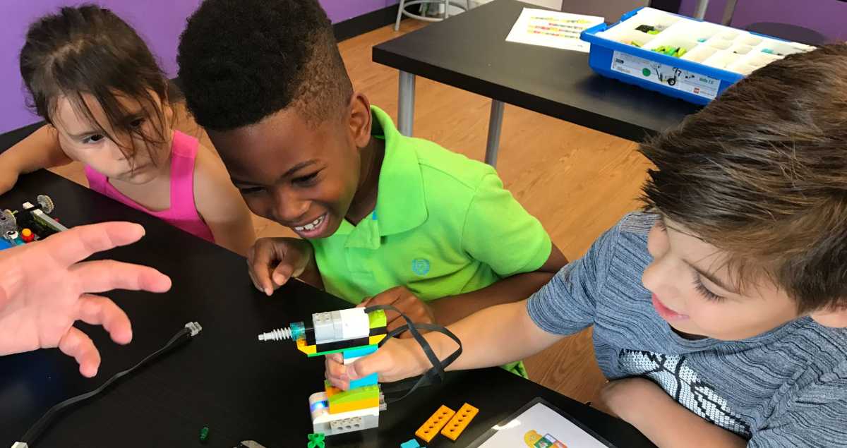 kids work on stem camp project