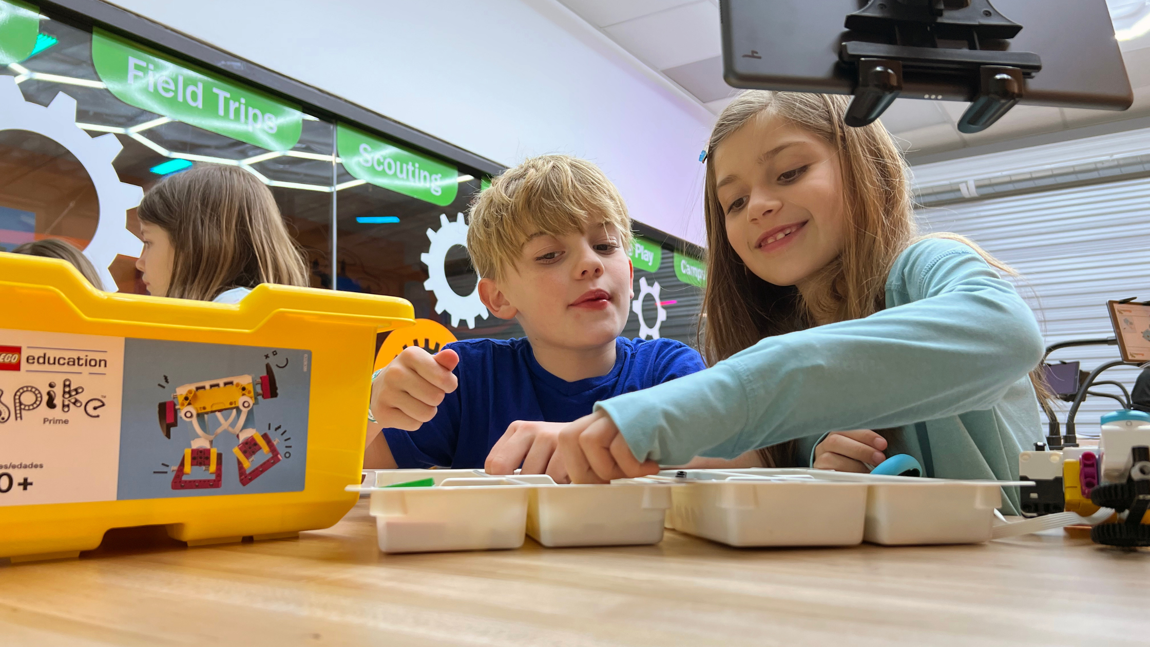 two children in a snapology robotics class